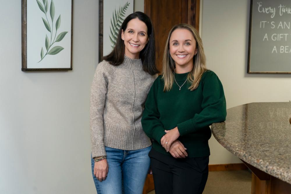 group shot of dr mackenzie platt and dr kacie sharpe | dentists lakeville